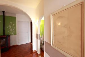 A television and/or entertainment centre at Tutti a casa di Pippo (100mq)