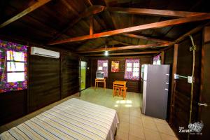 Postel nebo postele na pokoji v ubytování ECO-CABAÑAS Cancún