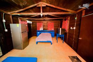 Postel nebo postele na pokoji v ubytování ECO-CABAÑAS Cancún
