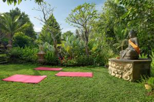 
A garden outside Ubud Nyuh Bali Resort & Spa
