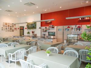 ห้องอาหารหรือที่รับประทานอาหารของ The Kinn Bangkok