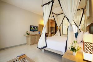 Access Resort & Villas - SHA Plus客房内的一张或多张床位
