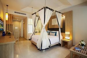 Access Resort & Villas - SHA Plus客房内的一张或多张床位