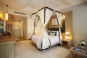 Access Resort & Villas - SHA Plus客房内的一张或多张床位