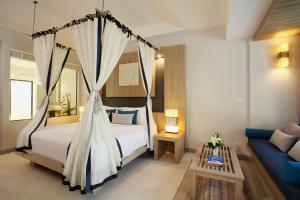 Access Resort & Villas - SHA Plus客房内的一张或多张床位