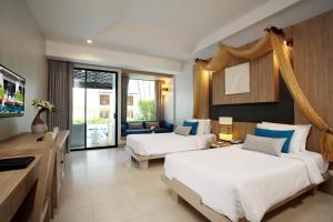 Access Resort & Villas - SHA Plus客房内的一张或多张床位
