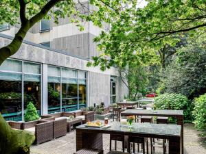 Um restaurante ou outro lugar para comer em Hotel Krefelder Hof