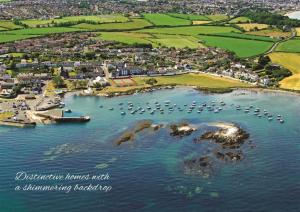 an aerial view of a harbor with boats in the water at Beachside Apartment in Bangor