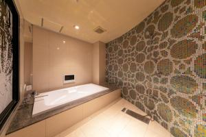 Postel nebo postele na pokoji v ubytování Hotel Eldia Yamanashi (Adult Only)