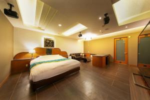 Postel nebo postele na pokoji v ubytování Hotel Eldia Yamanashi (Adult Only)