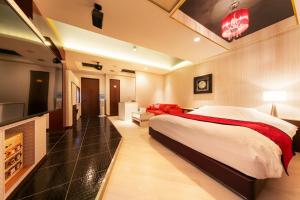Postel nebo postele na pokoji v ubytování Hotel Eldia Yamanashi (Adult Only)