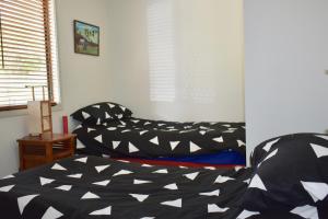 Een bed of bedden in een kamer bij Lazyu
