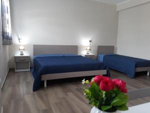 Posteľ alebo postele v izbe v ubytovaní AF service b&b