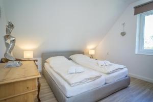 Postel nebo postele na pokoji v ubytování Wildrose OG
