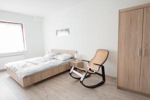 Posteľ alebo postele v izbe v ubytovaní Apartament Zebcowska