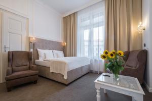 Postel nebo postele na pokoji v ubytování Apartmány Arte