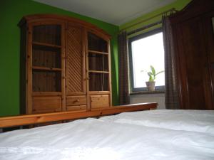 Ліжко або ліжка в номері Ferienwohnung Meyenburg