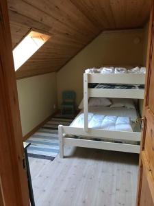 Postel nebo postele na pokoji v ubytování Högetorp + 3 fotografie
