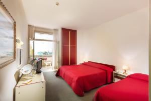 Postel nebo postele na pokoji v ubytování Hotel Metropol + 37 fotografií