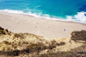 an overhead view of a beach with people on it at João Jungle in Açafora