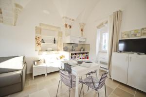 Kuchyňa alebo kuchynka v ubytovaní Scirocco Apartment with terrace by Wonderful Italy