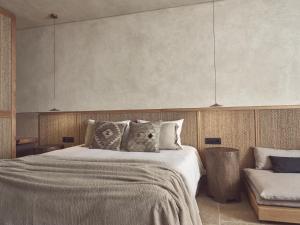 A bed or beds in a room at Olea All Suite Hotel, a Member of Design Hotels