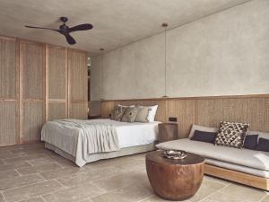 A bed or beds in a room at Olea All Suite Hotel, a Member of Design Hotels