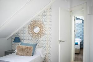 Posteľ alebo postele v izbe v ubytovaní Feelathome Mártires Apartments