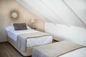Posteľ alebo postele v izbe v ubytovaní Feelathome Mártires Apartments