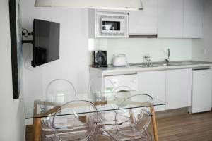 Kuchyňa alebo kuchynka v ubytovaní Feelathome Mártires Apartments