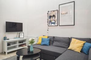 Televízia a/alebo spoločenská miestnosť v ubytovaní CYC Apartment