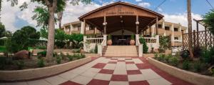 a gazebo in front of a building at Golden days in Afantou