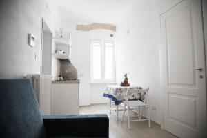 Kuchyň nebo kuchyňský kout v ubytování Tre Archi Apartment & Relais