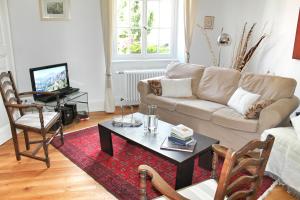 TV a/nebo společenská místnost v ubytování La Maison des Fontaines d'Alsace