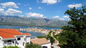 a view of a town and a body of water at Apartment Ana in Vinjerac