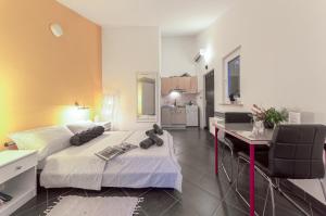 Postel nebo postele na pokoji v ubytování Apartments Lodra