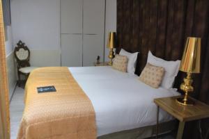 Cama ou camas em um quarto em Hotel Art Santander