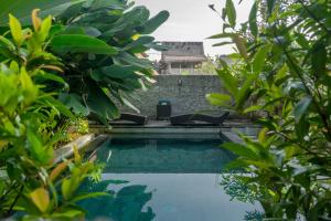 The swimming pool at or close to Eka Bali Guest House