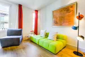 Zona de estar de Cosmo Apartments Passeig de Gràcia 53 fotos más