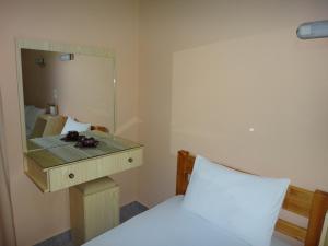 Ένα ή περισσότερα κρεβάτια σε δωμάτιο στο Despoina Apartments