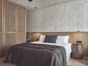 A bed or beds in a room at Olea All Suite Hotel, a Member of Design Hotels