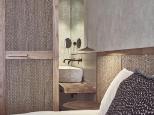 A bed or beds in a room at Olea All Suite Hotel, a Member of Design Hotels