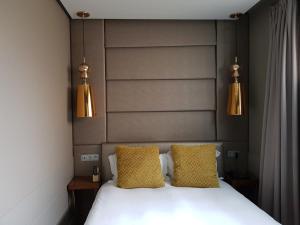 Cama ou camas em um quarto em Hotel Art Santander