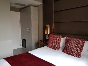 Cama ou camas em um quarto em Hotel Art Santander