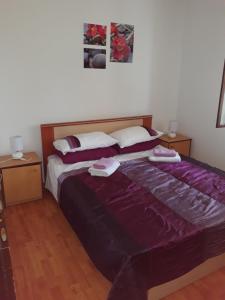 Кровать или кровати в номере Apartments Marević