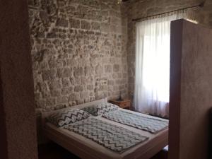 Postel nebo postele na pokoji v ubytování Four Towers Apartments