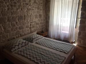 Postel nebo postele na pokoji v ubytování Four Towers Apartments