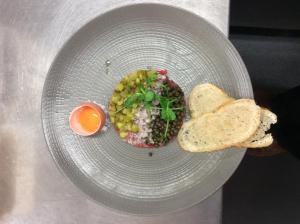 a bowl of food with an egg and bread at The New Inn in Cerne Abbas