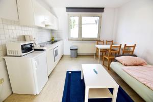 Dapur atau dapur kecil di Apartments Köln Gremberghofen