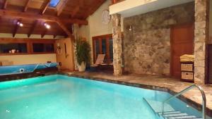 a large swimming pool in a house at Casa Bonita Navacerrada in Navacerrada